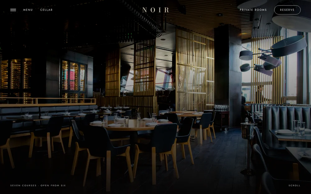 Noir, candlelit fine-dining restaurant website